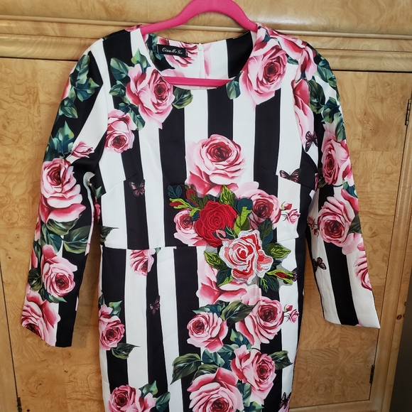 Stripe/Floral trumpet flare Dress. - Picture 2 of 4